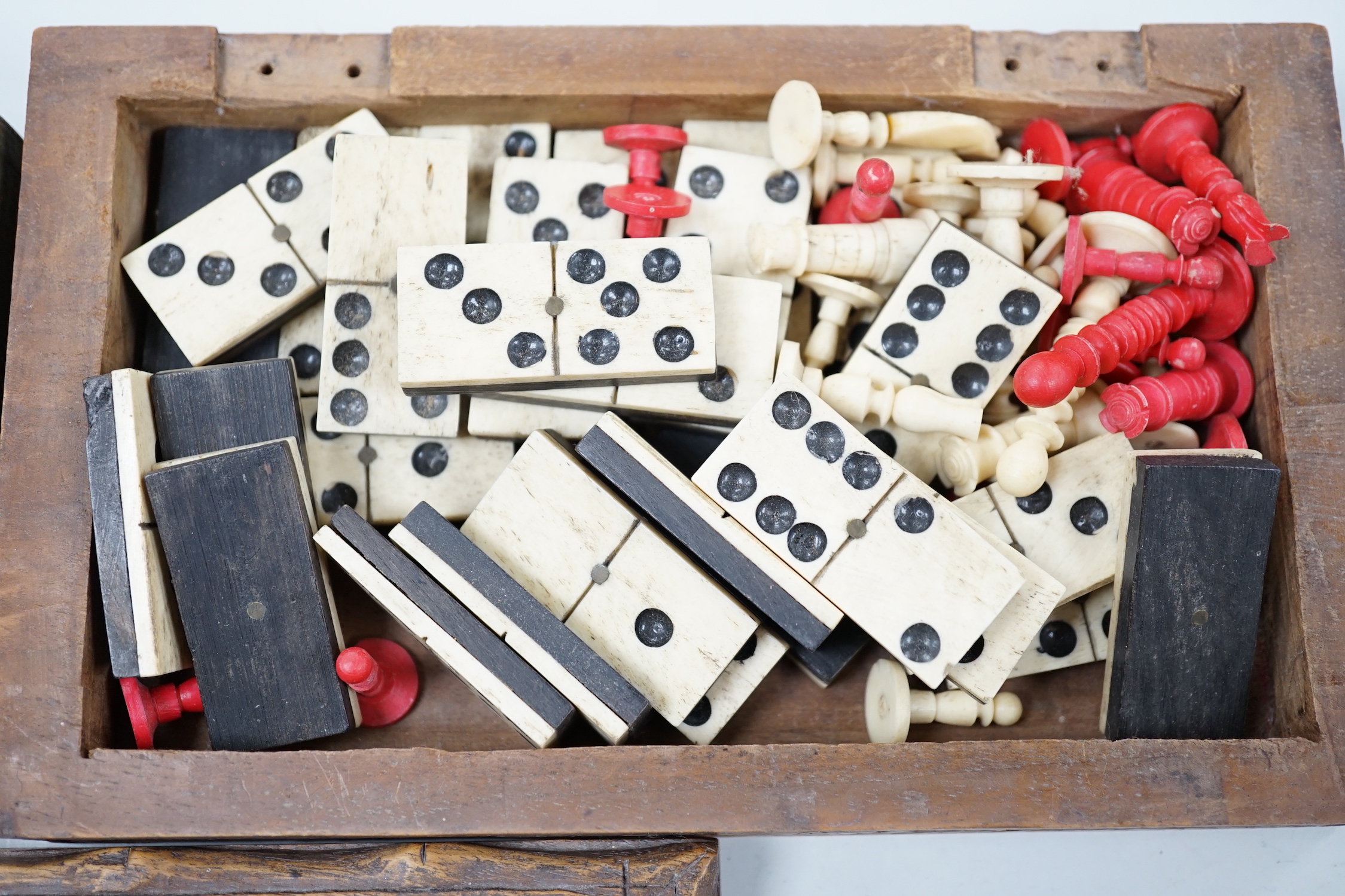 A bone domino and chess set and a cards and box